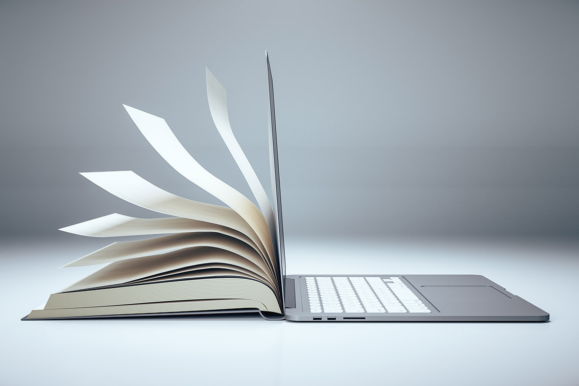 print book and digital laptop